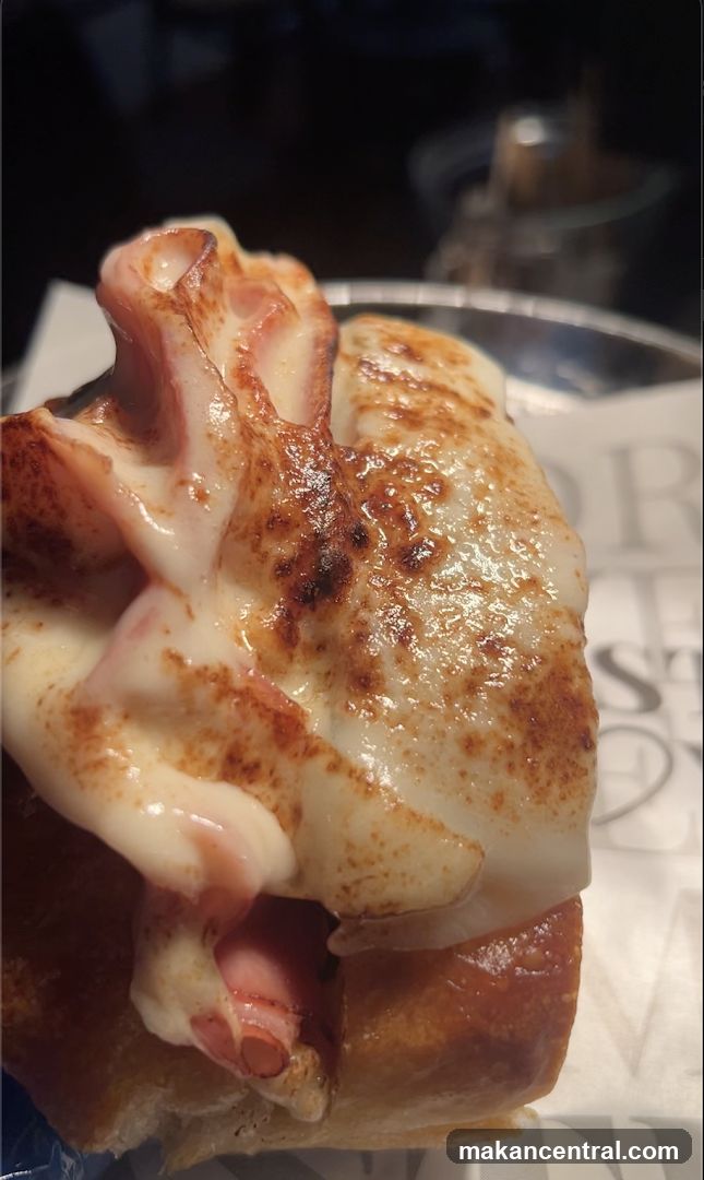 Gourmet Hot Dog with Melted Cheese and Bacon