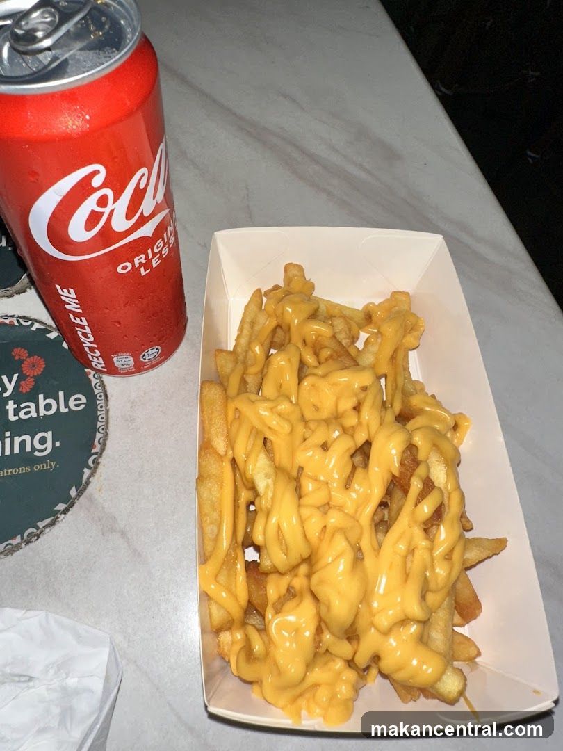 Cheese Fries and Coca-Cola