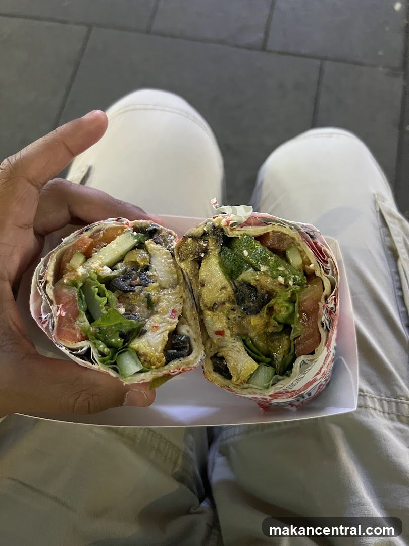 Halved wrap with chicken and vegetables