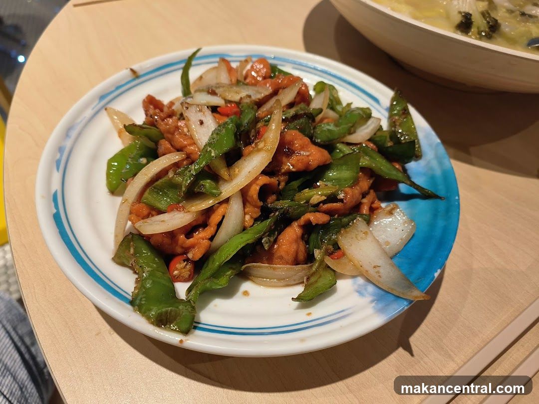 Stir-fried dish with peppers and onions