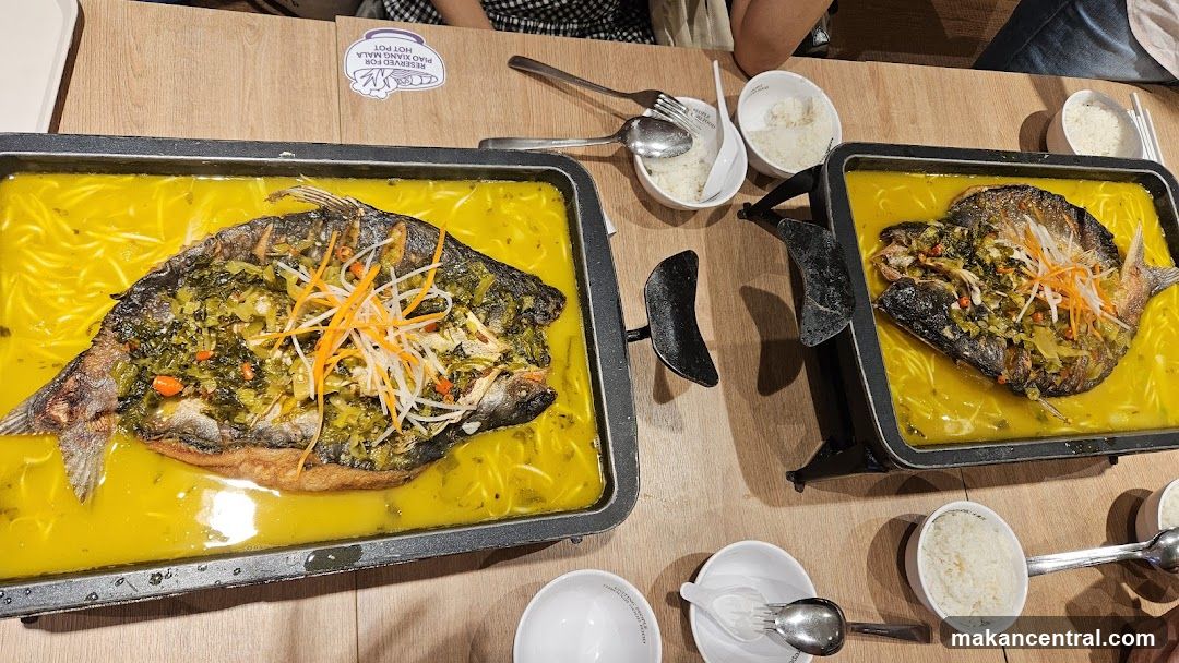 Two whole fish dishes with rice