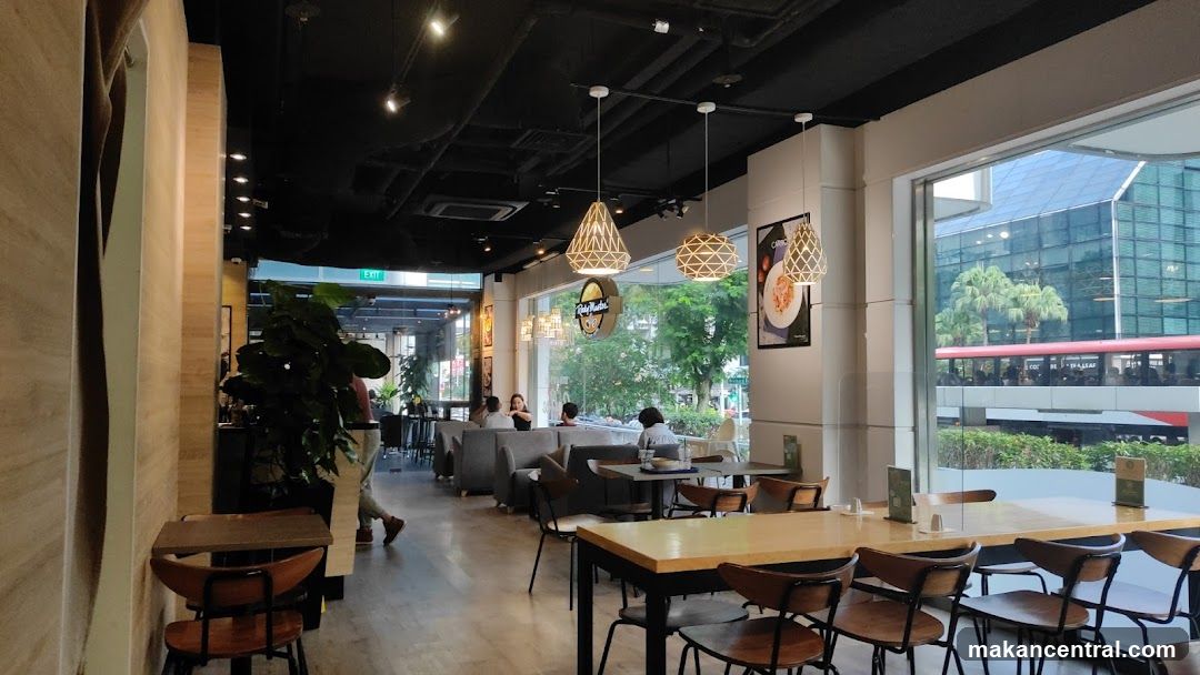 Cafe Interior with Seating and Large Window