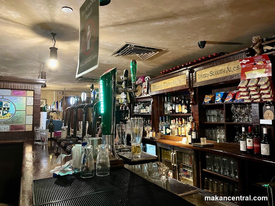 Bar Interior with Beer Taps and Shelves of Alcohol