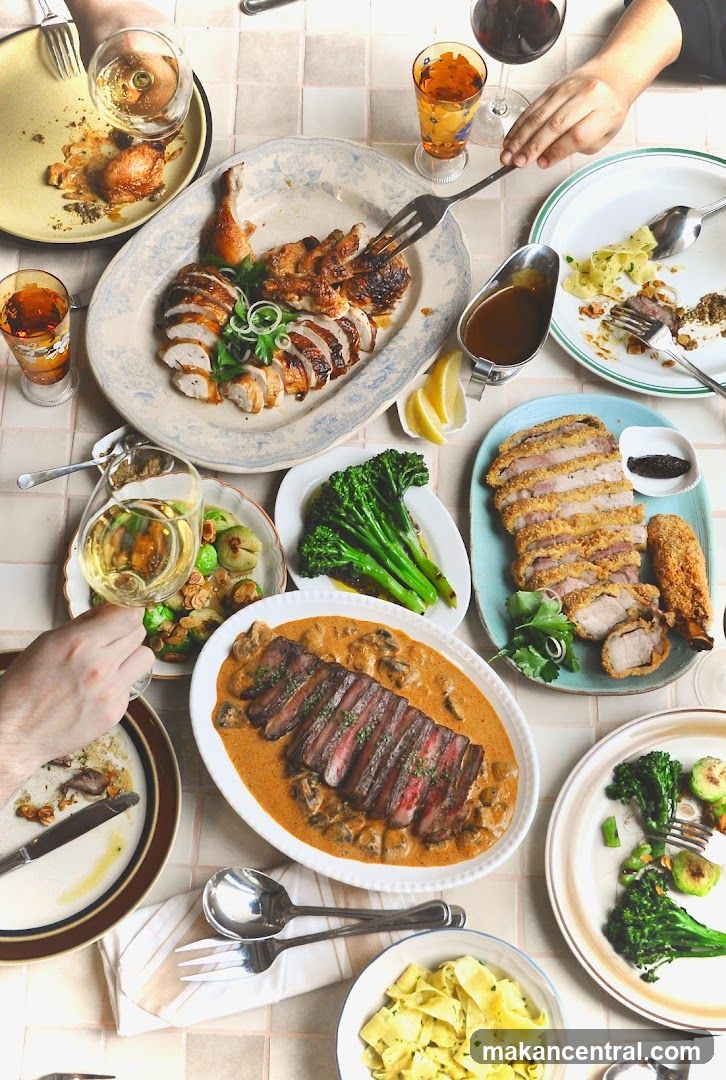 A table laden with various dishes and drinks.