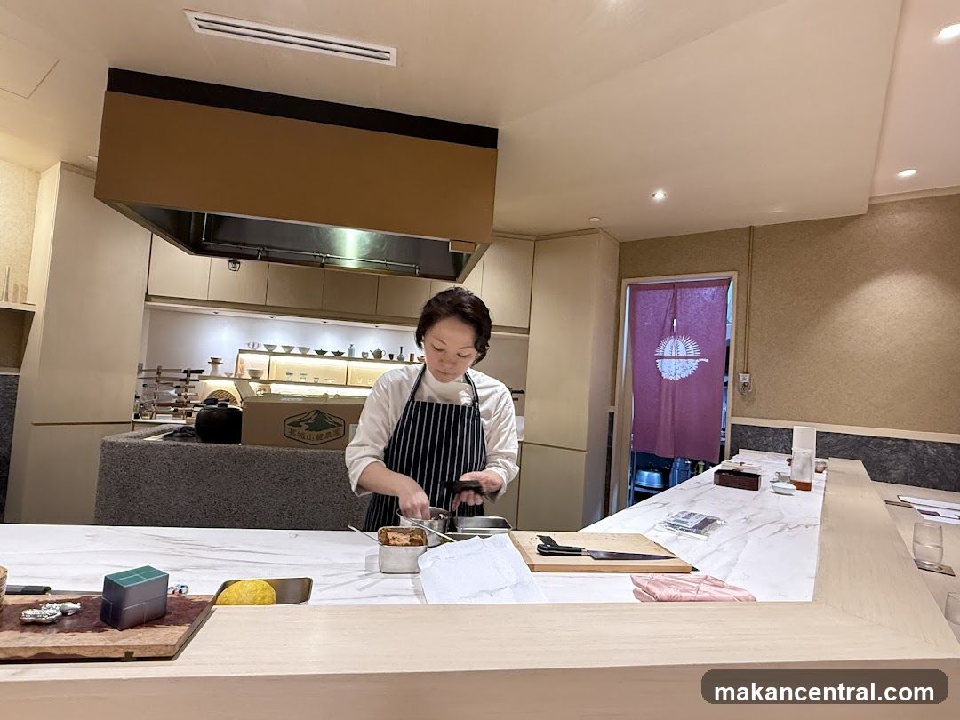 Chef preparing food at a counter