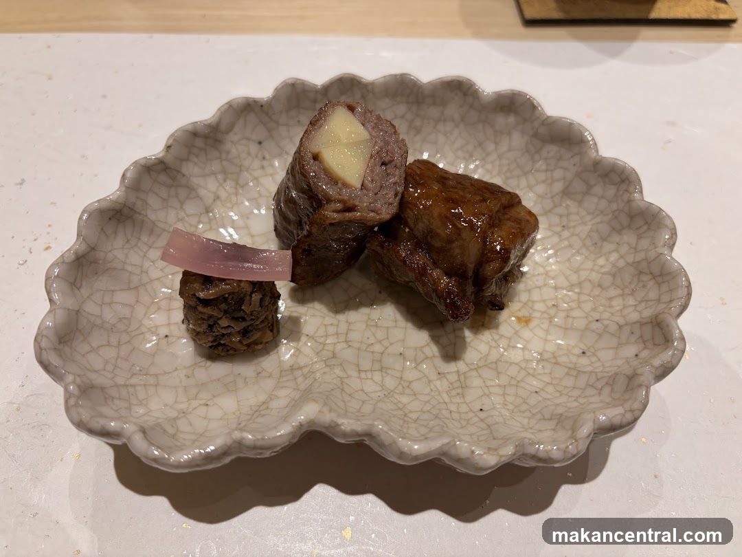 Appetizer with Meat Rolls and Pickled Onion