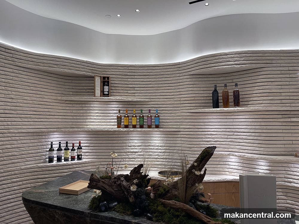 Bar with Bottles on Shelves