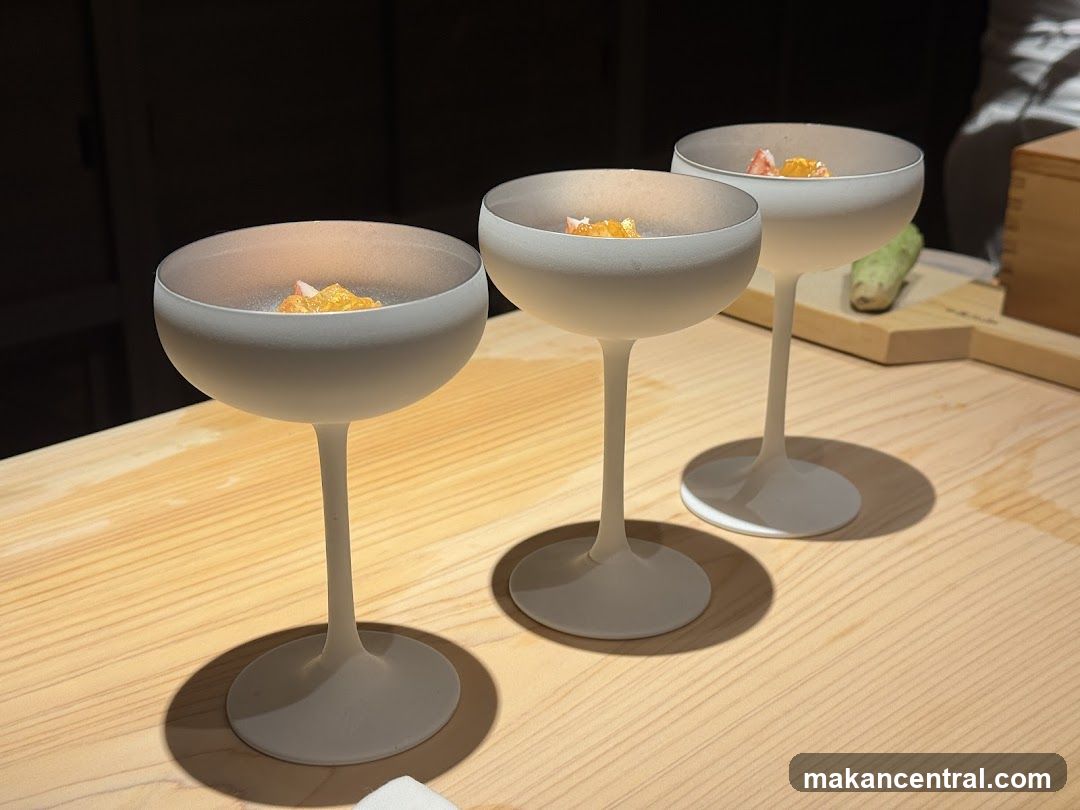 Three Frosted Coupe Glasses with Appetizers