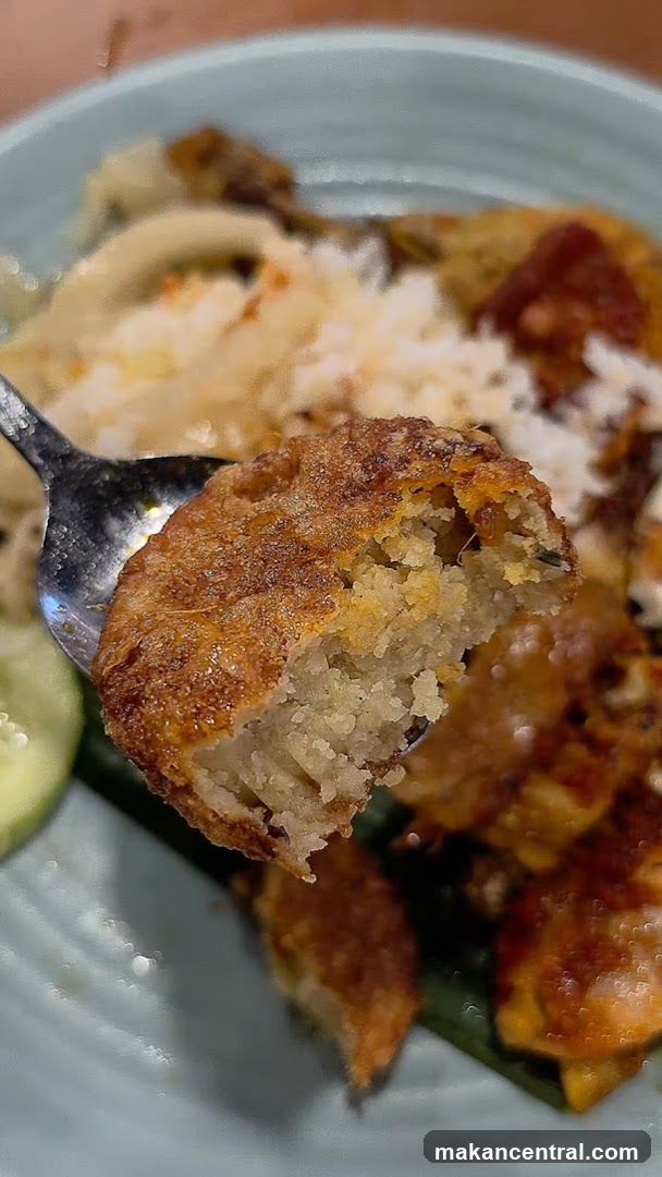 Fried Patty on Spoon with Meal