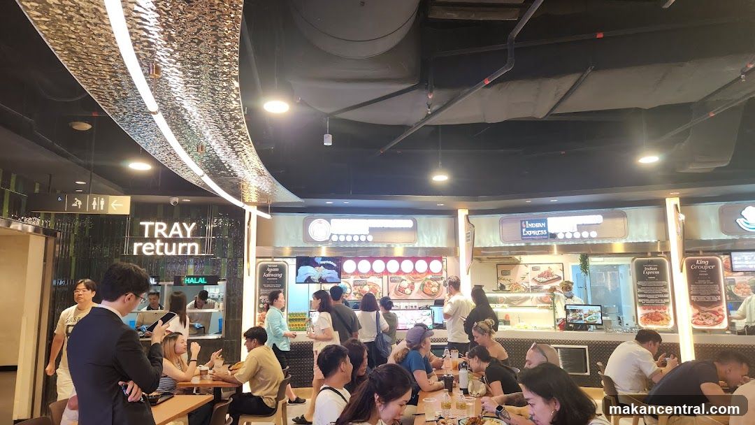 Food court with various stalls and diners