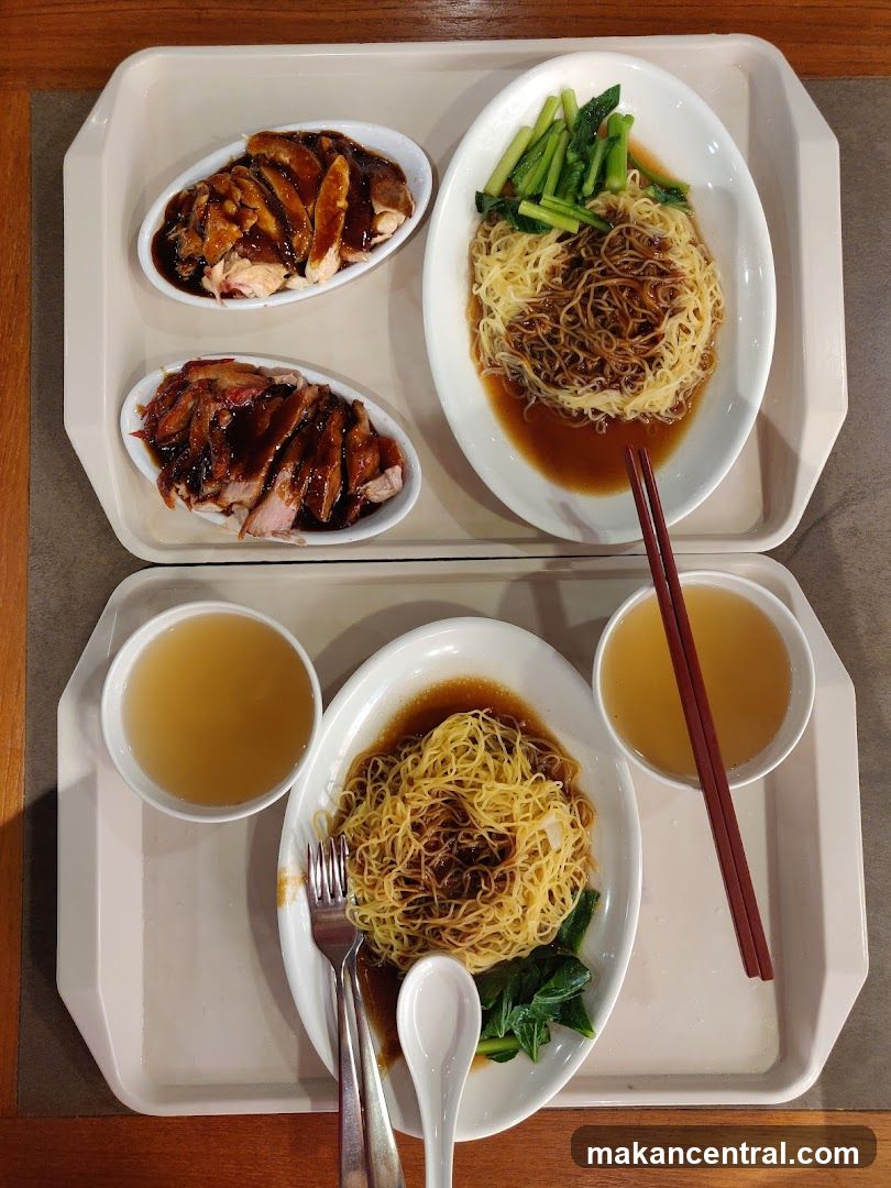 Two Trays of Asian Noodles and Meats