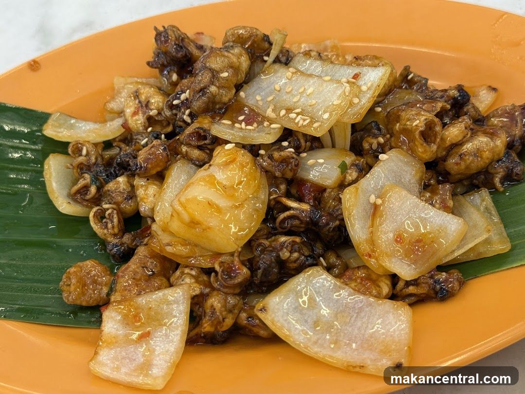 Stir-fried dish with onions and sesame seeds