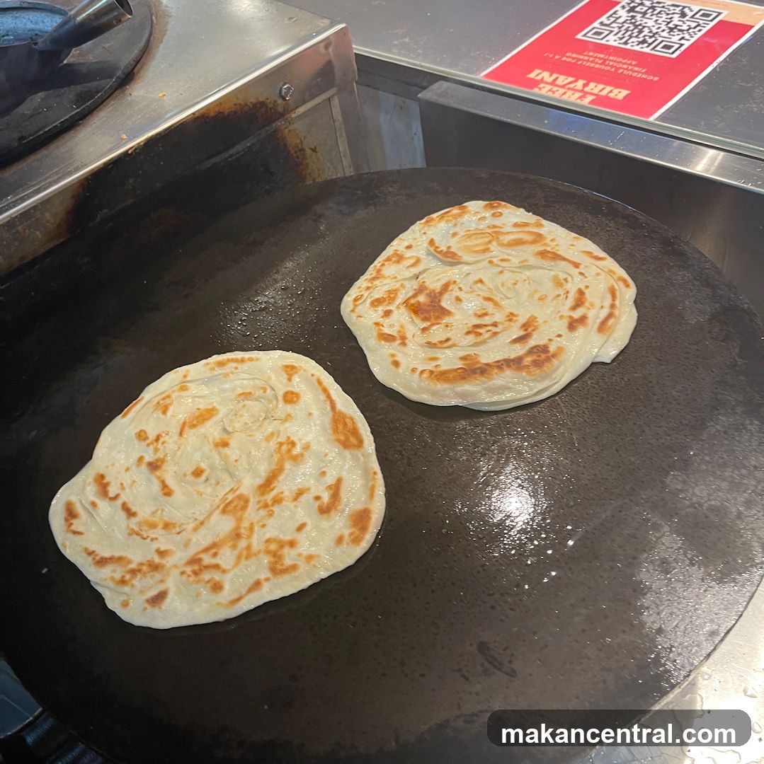 Roti being cooked