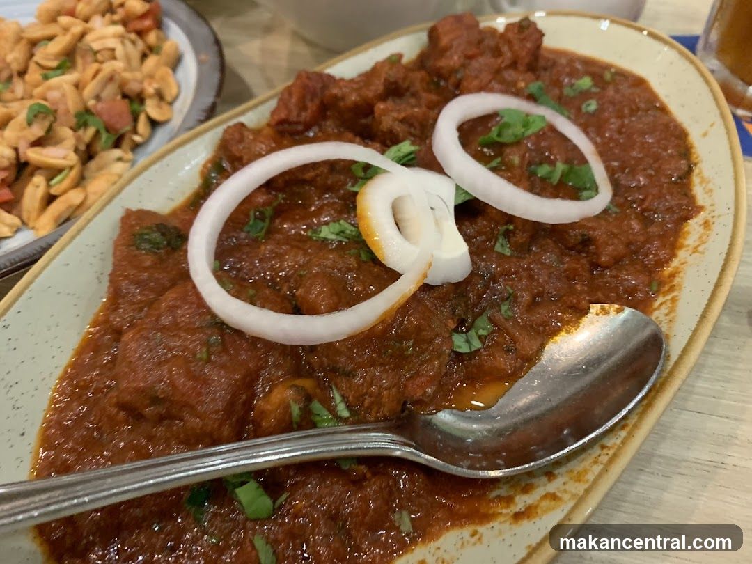 Indian Curry with Onion Garnish