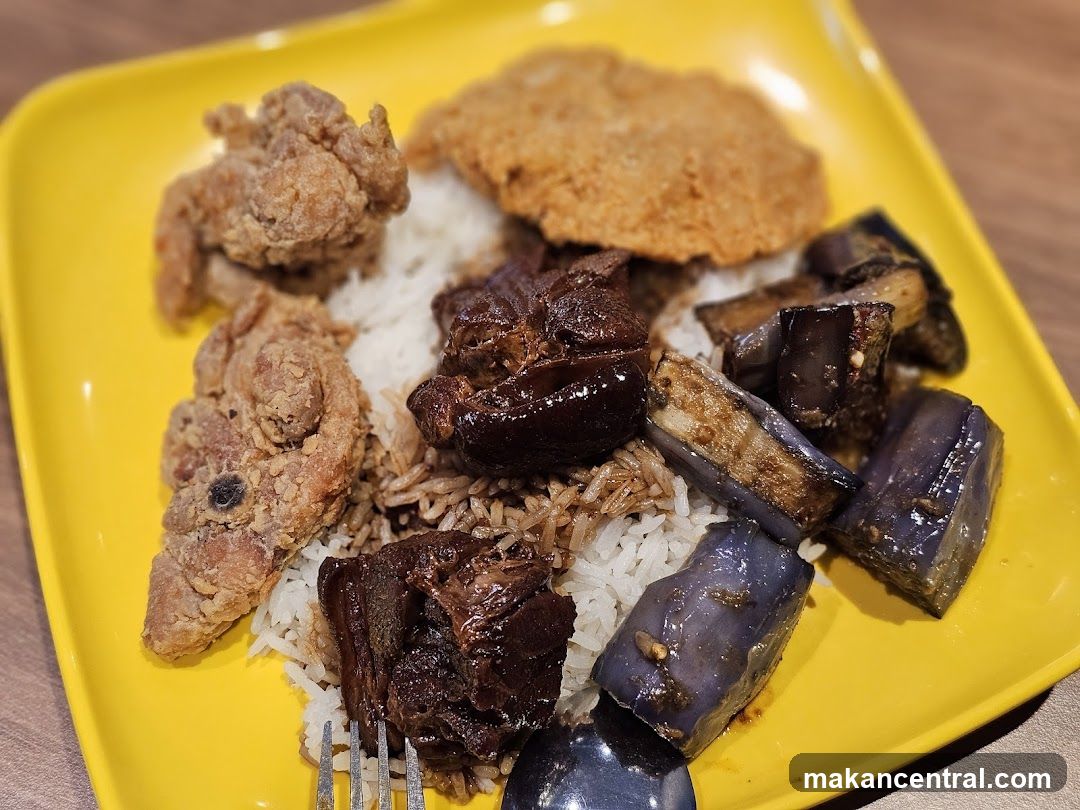 Plate of Rice with Various Toppings