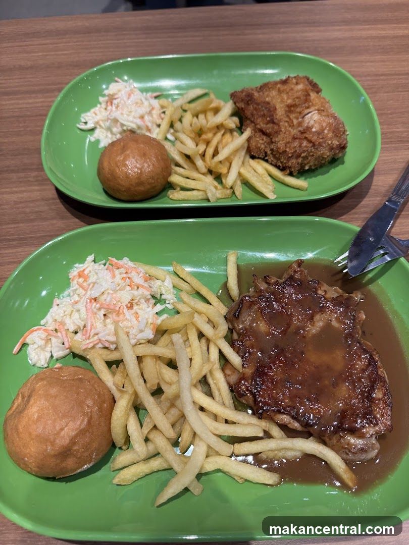 Two plates of chicken meals