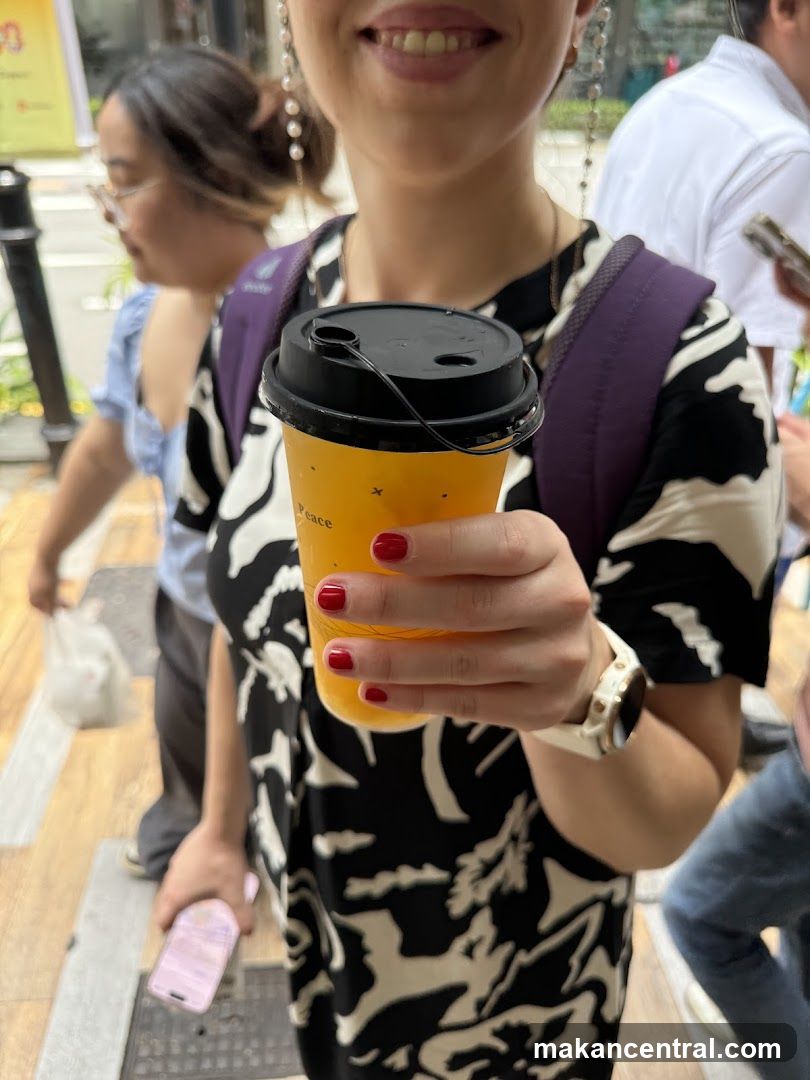 Woman holding a drink