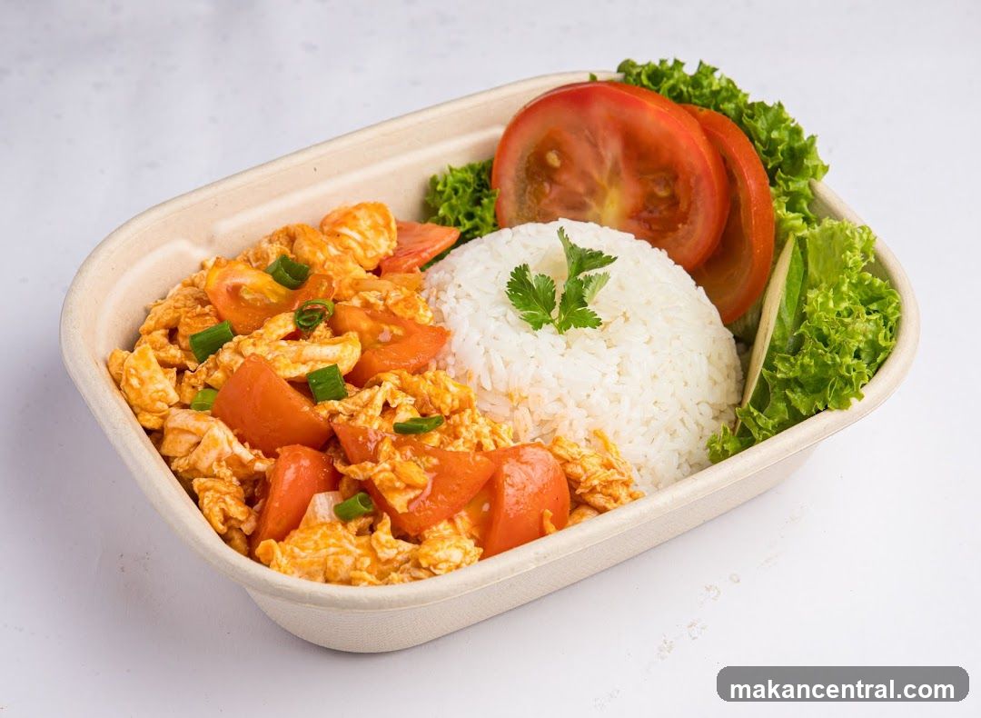 Scrambled Eggs with Tomatoes and Rice