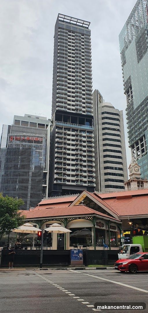 Street view with buildings and a low-rise structure