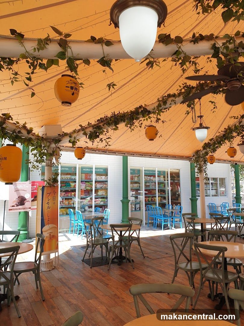 Outdoor Seating Area with Shelves of Goods