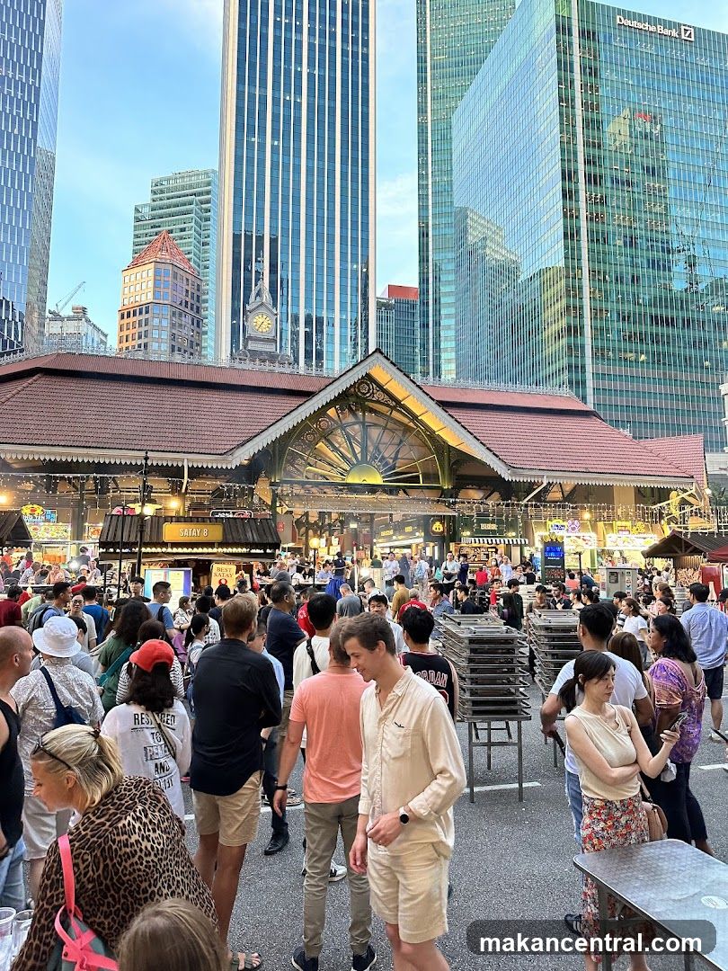 Outdoor Food Market with City Skyline