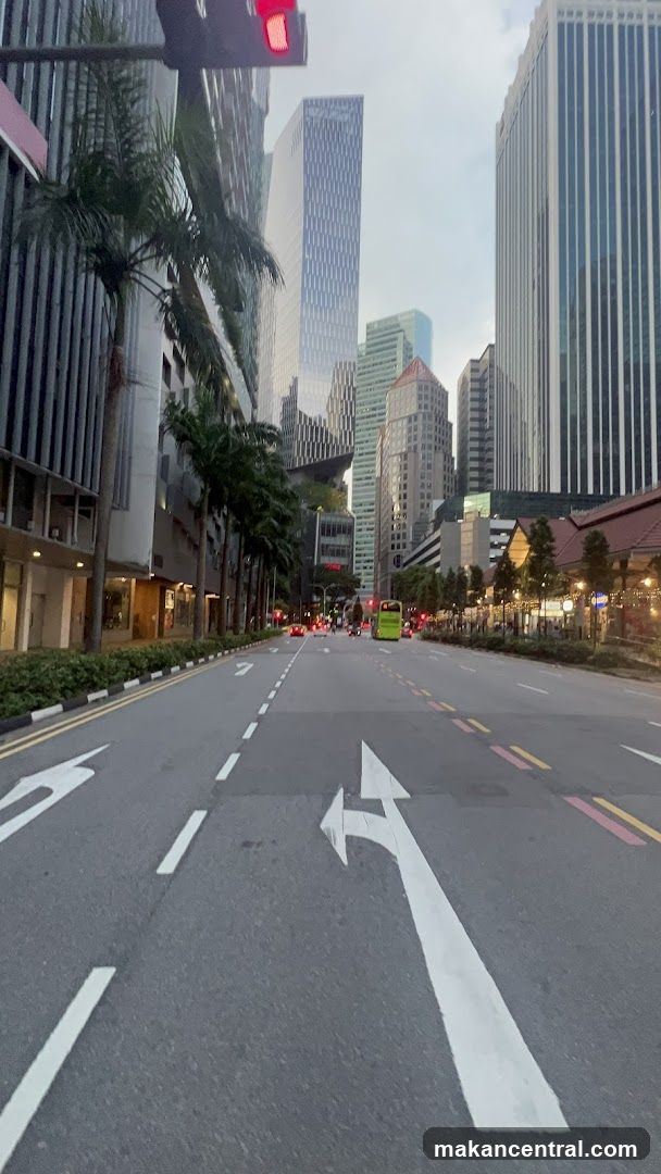 City Street with Traffic and Skyscrapers