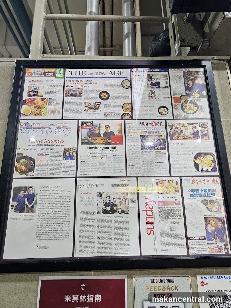 Newspaper clippings about local hawkers and noodle restaurants