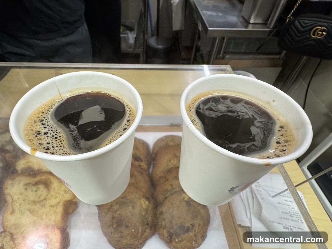 Two Cups of Coffee and Pastries