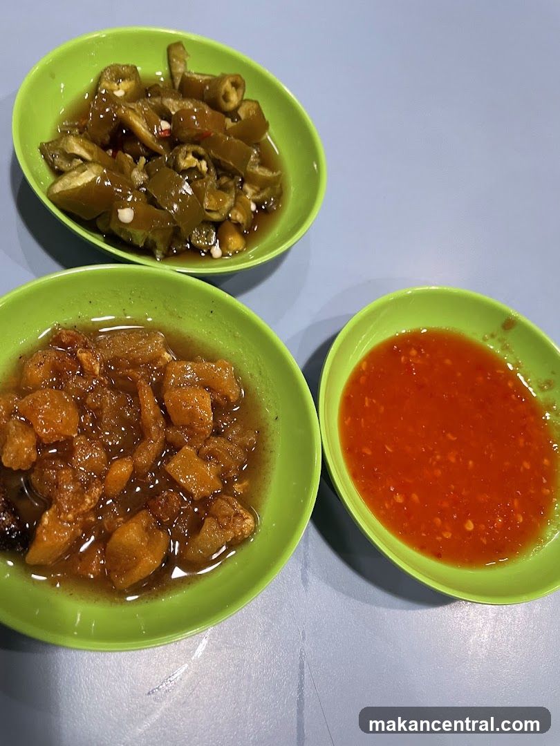 Three Small Bowls of Condiments