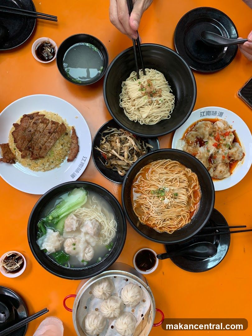 Table with various Chinese dishes