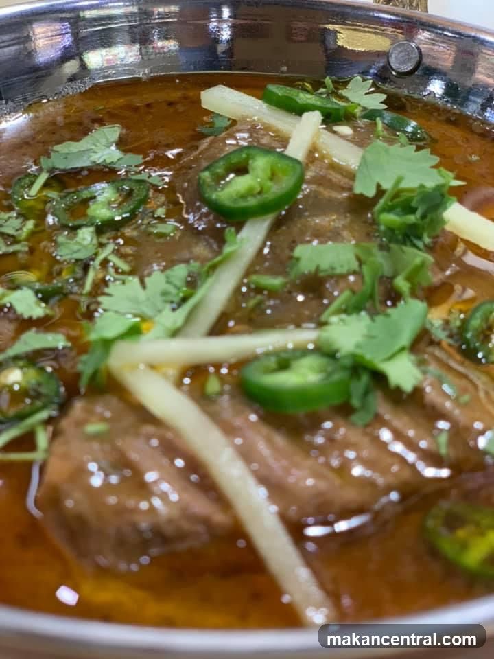 Spicy Stew with Meat and Garnish