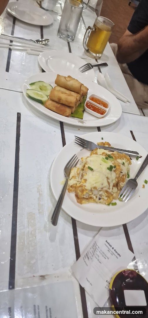 Dine-in Meal with Spring Rolls and Omelette