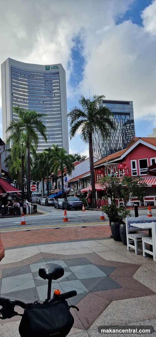 Street Scene with Buildings and Palm Trees