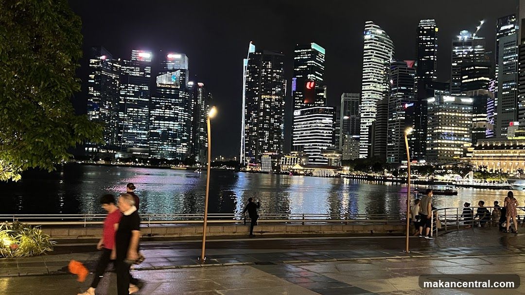 Night View of a City Skyline by the Water