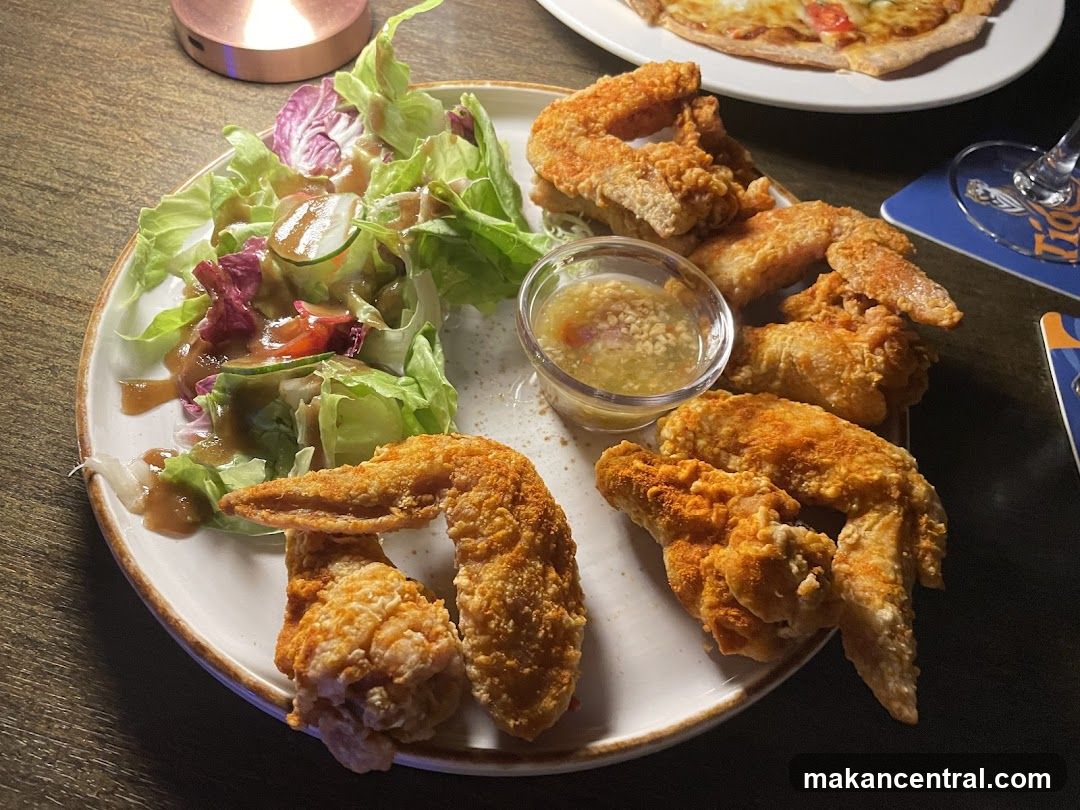 Fried Chicken Wings and Salad