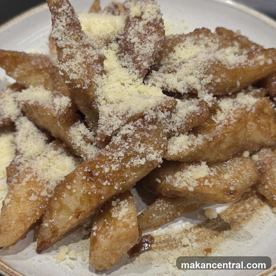 Fried Potatoes with Grated Cheese