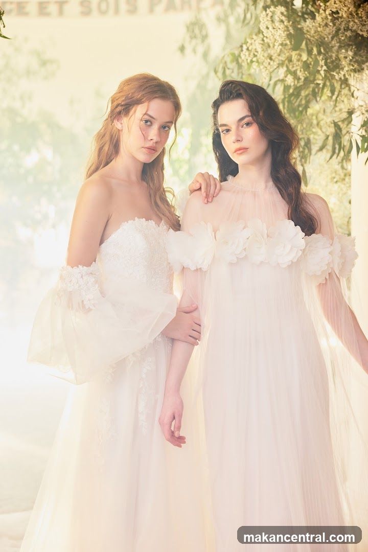 Two women in white dresses