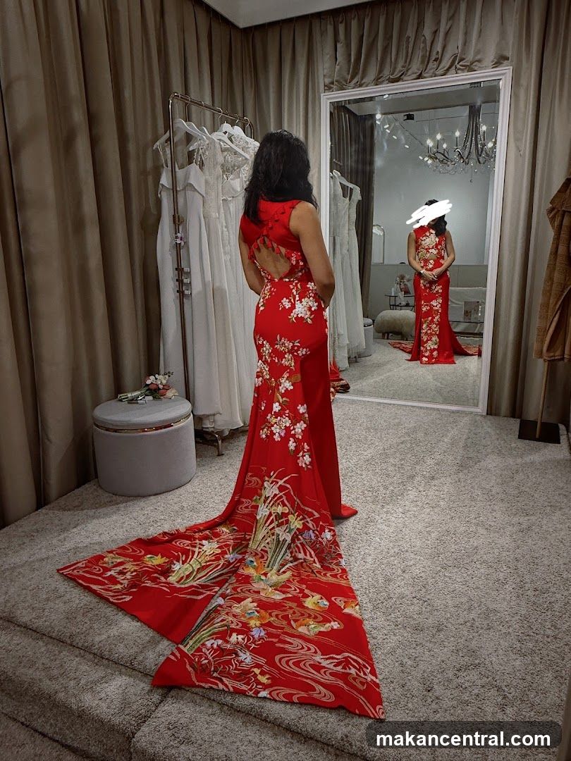 Woman in Red Dress in Bridal Shop