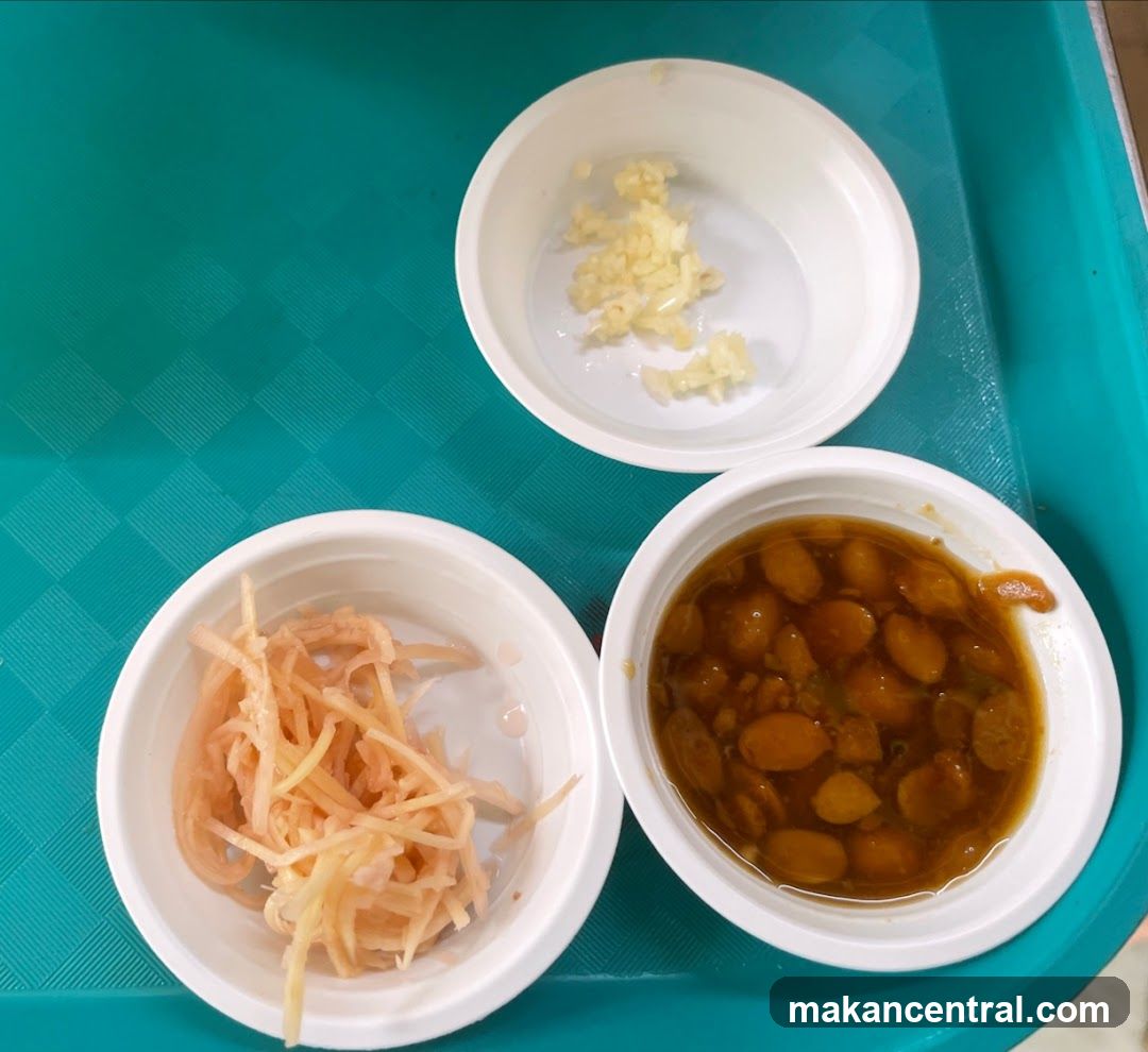 Three small bowls of food ingredients