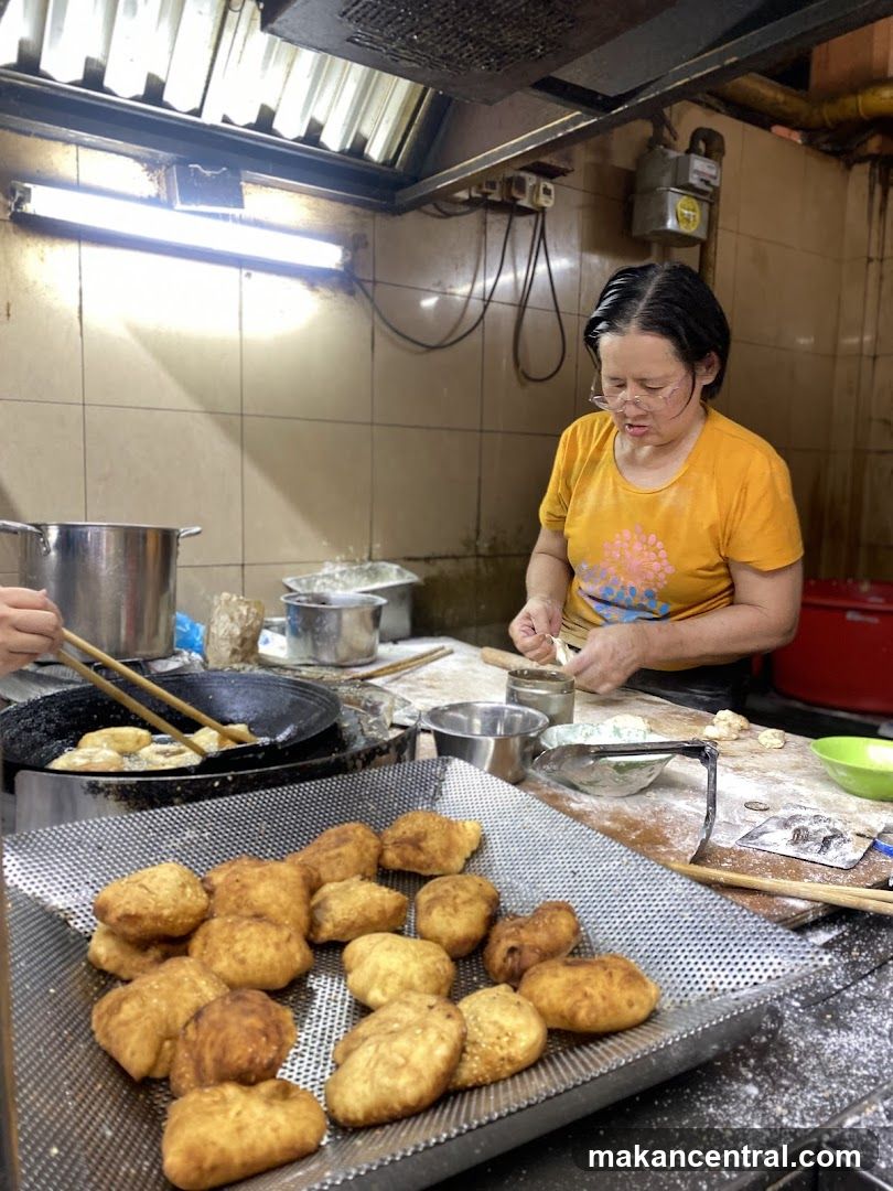 Woman preparing fried dough