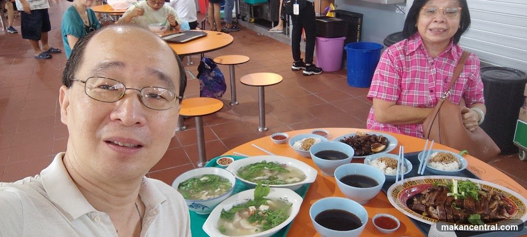 People eating at a food court