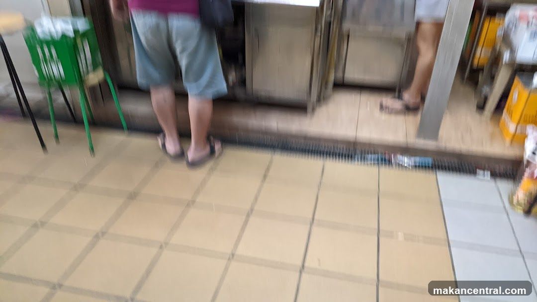 People standing near a counter