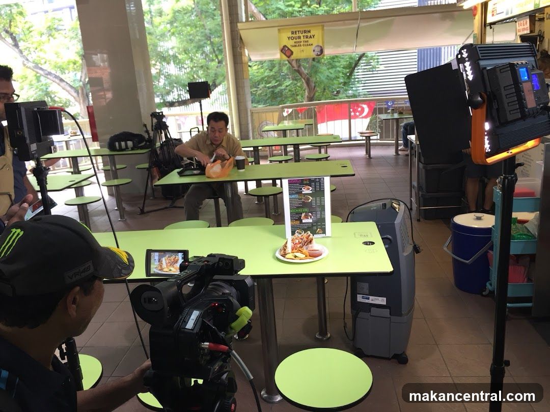Filming a food stall