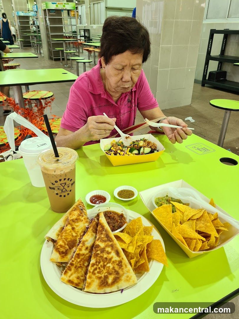 Woman eating at a food court