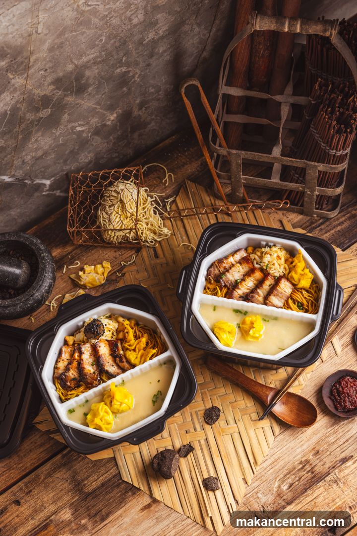 Two Bento Boxes of Noodles with Pork Belly