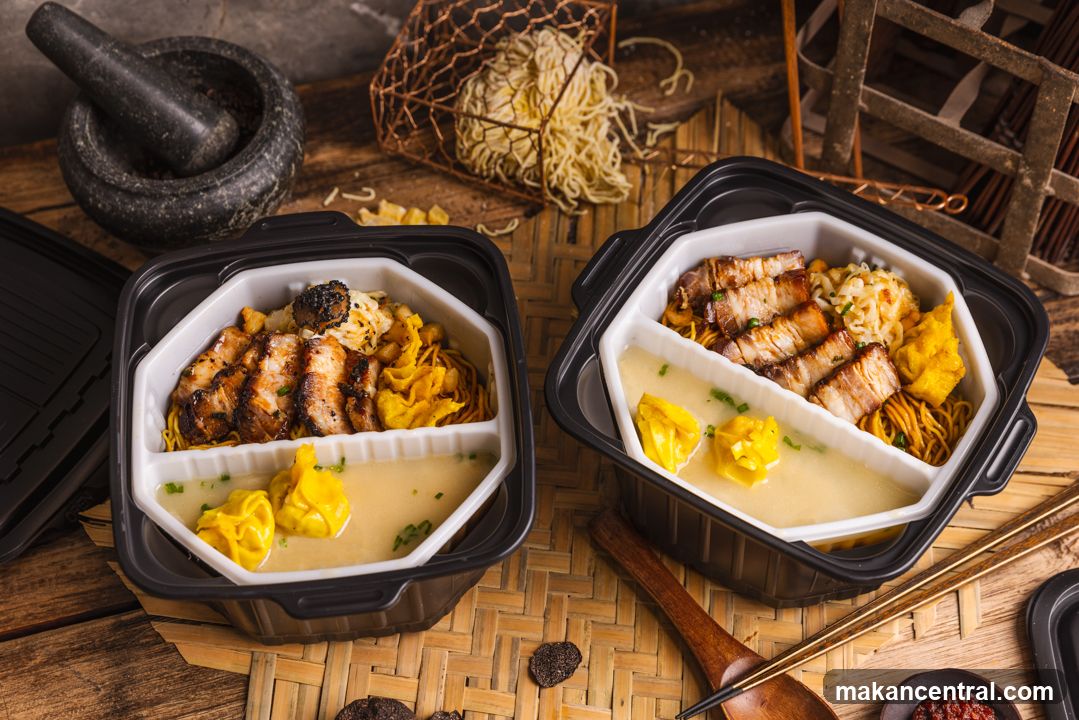 Two Bento Boxes with Pork and Noodles