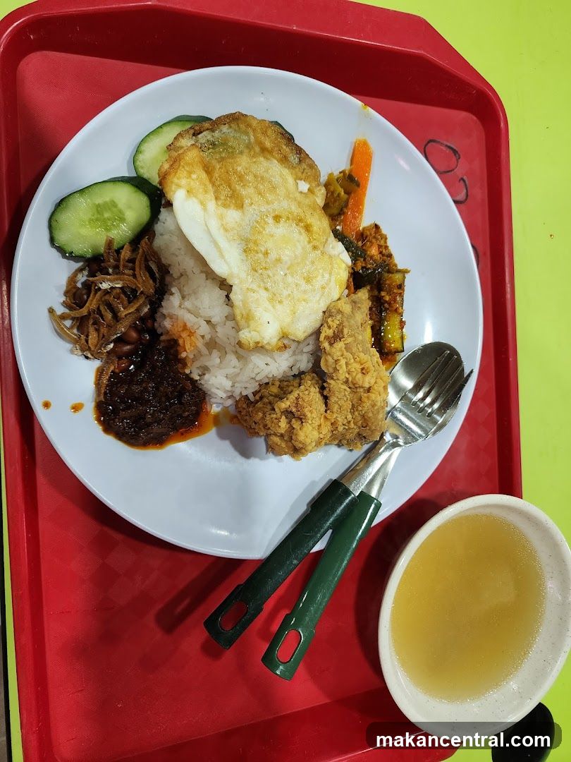 Nasi Lemak with Fried Chicken and Egg