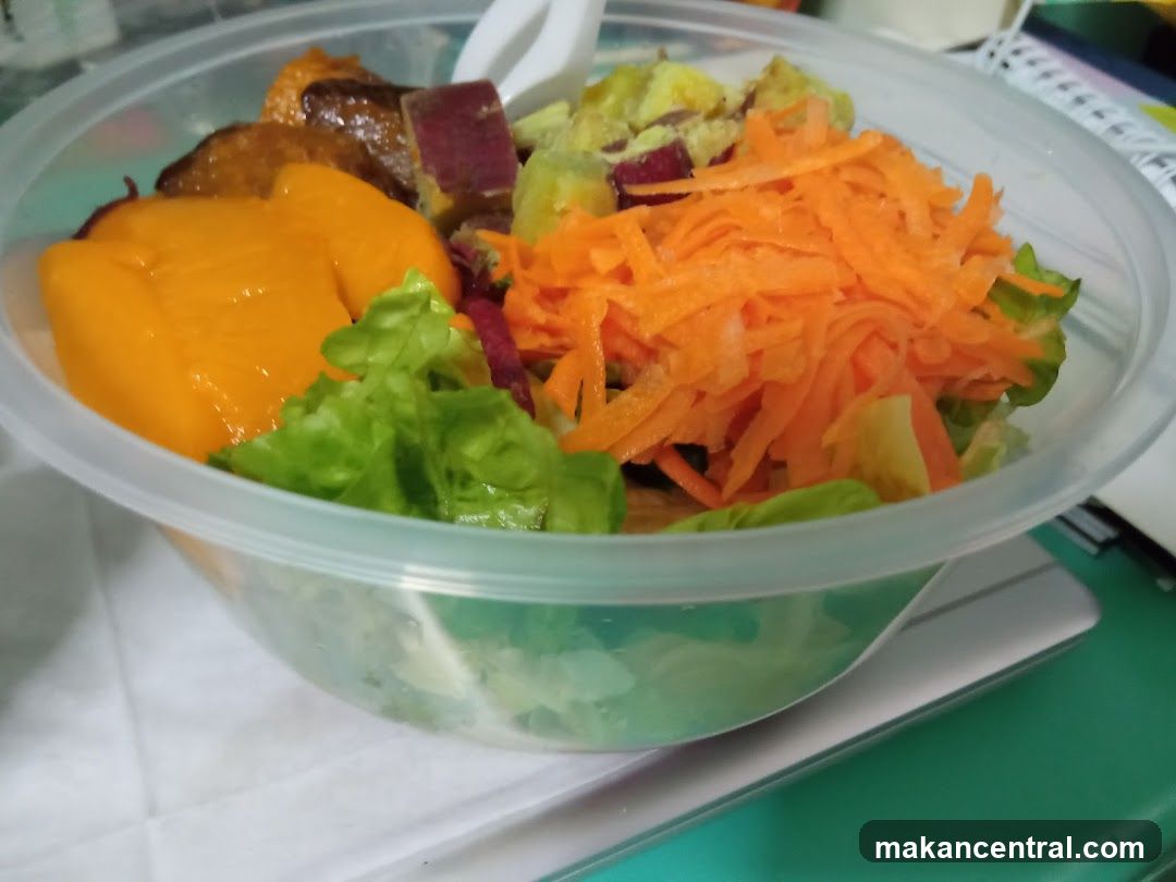 Salad in a plastic container