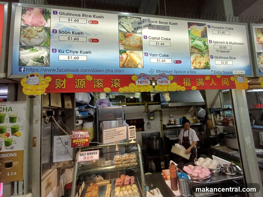 Food stall with menu and staff