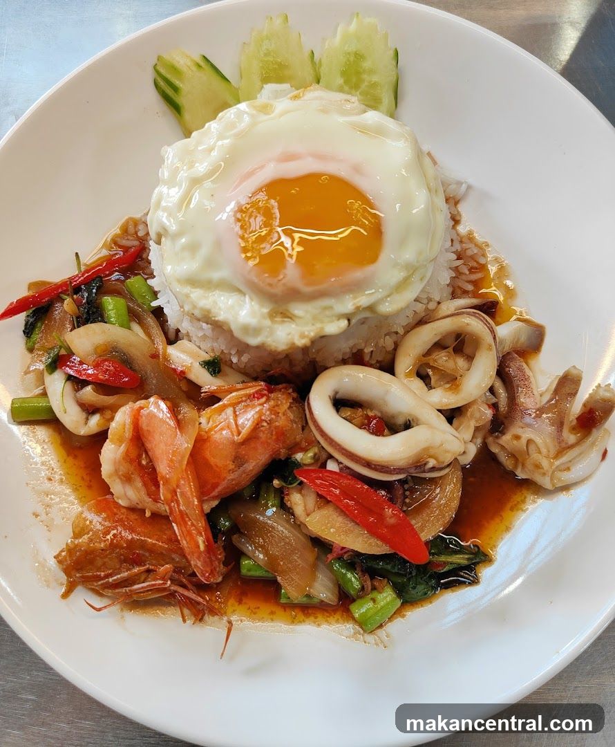 Seafood Stir-fry with Fried Egg